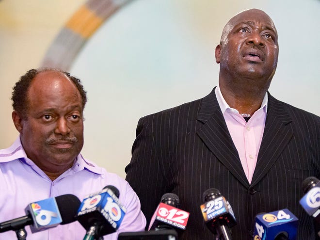 Terry Banks, right, speaks about his nephew, Corey Jones, next to Bishop Thomas Masters during a news conference at the Bible Church of God in Boynton Beach on Wednesday.
