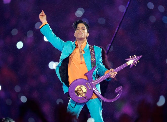 FILE - In this Feb. 4, 2007 file photo, Prince performs during the halftime show at the Super Bowl XLI football game at Dolphin Stadium in Miami. The music icon died April 21 at his suburban Minneapolis home at age 57.