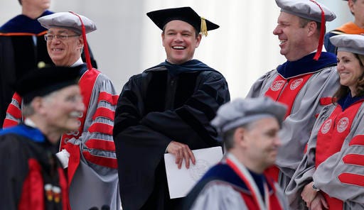 Actor Matt Damon smiles during the academic procession at the Massachusetts Institute of Technology's commencement in Cambridge, Mass., Friday, June 3, 2016. Damon won an Academy Award for co-writing the 1997 film "Good Will Hunting", where he portrayed a mathematically gifted MIT janitor. (AP Photo/Charles Krupa)