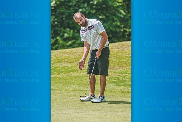 Colton Sapp motions to the putt which didn't go in on #17 at Holly Ridge Golf Links during the Asheboro City Amateur.
PHOTO BY PAUL CHURCH