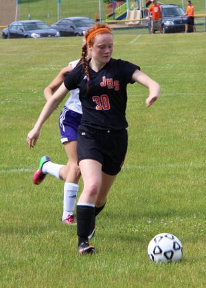 Jonesville's Katie Brown and Hanna Purdy each recorded hat tricks in the Comets district semifinal game against Onsted. MATTHEW LOUNSBERRY PHOTO