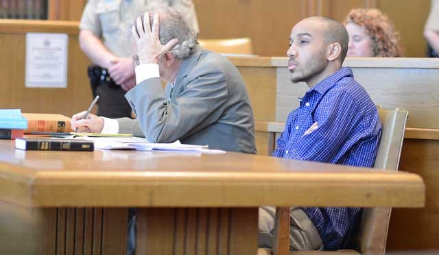 Kion Tyearl Dail listens to closing arguments Friday in Lenoir County Superior Court. A jury convicted Dail of first-degree murder for killing House of Wang dishwasher Thomas Terrell Hinton on June 2, 2011.