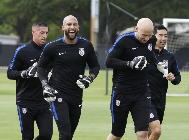 In this March 21 photo, U.S. soccer goalkeepers Tim Howard, left, and Brad Guzan, warm up during a training sesson at Barry University in Miami Shores, Fla. Guzan is set to start ahead of veteran Tim Howard for the U.S. national team in the upcoming Copa America tournament, coach Jurgen Klinsmann announced Saturday,
