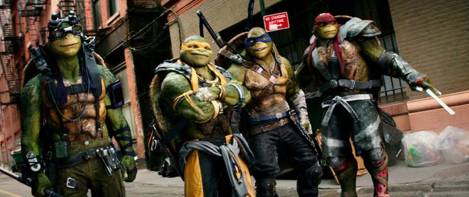 Actor Alan Ritchson, a Niceville High School graduate, portrays Raphael (right) in the new movie “Teenage Mutant Ninja Turtles: Out of the Shadows.”