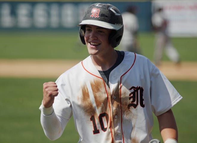 Marlboro catcher Cole Nicolis reacts after scoring the game's first run of the team's 5-2 win over Keio Academy in an opening-round game of the Class B state tournament on Thursday. WILLIAM MONTGOMERY/TIMES HERALD-RECORD