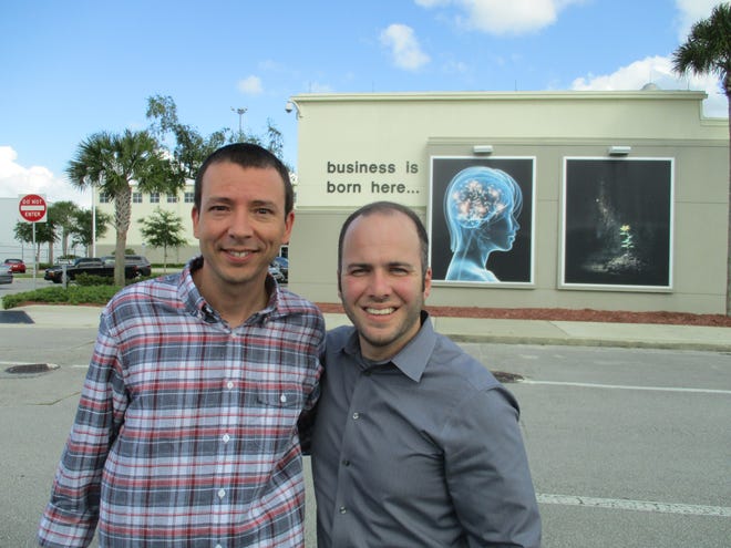 Art Zimmet, left, and Michael Zaharios III, stand in front of the UCF Business Incubator at Daytona Beach International Airport where the Florida Virtual Entrepreneur Center has its office. Zaharios is the statewide program's director. Zimmet is the center's newly hired program manager. NEWS-JOURNAL/CLAYTON PARK
