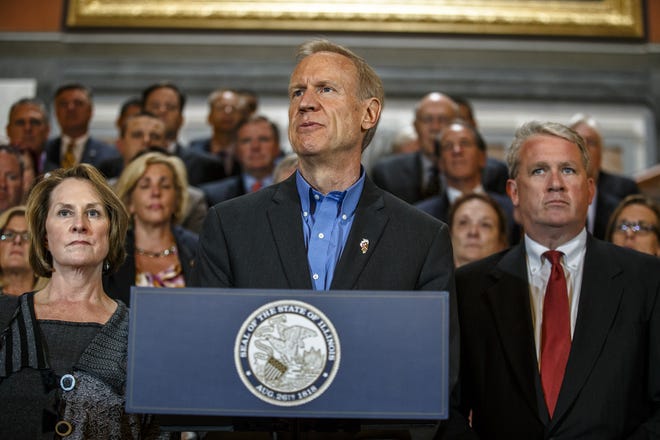 Illinois Gov. Bruce Rauner, center, along with Illinois Senate Minority Leader Christine Radogno, R-Lemont, and Illinois House Minority Leader Jim Durkin, R-Western Springs, hold a press conference on the second floor steps on the final day of the spring legislative session at the Illinois State Capitol, Tuesday, May 31, 2016, in Springfield, Ill. Justin L. Fowler/The State Journal-Register