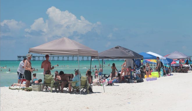 Tents line the beach Thursday. The Panama City Beach City Council is proposing a ban on tents 10 feet wide or larger from Memorial Day to Labor Day.