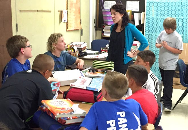 Julianne Pennabaker, a sixth-grade teacher at Milford Middle School, is one of four teachers nationwide to be named 2016 SpringBoard Teachers of Distinction by the College Board.