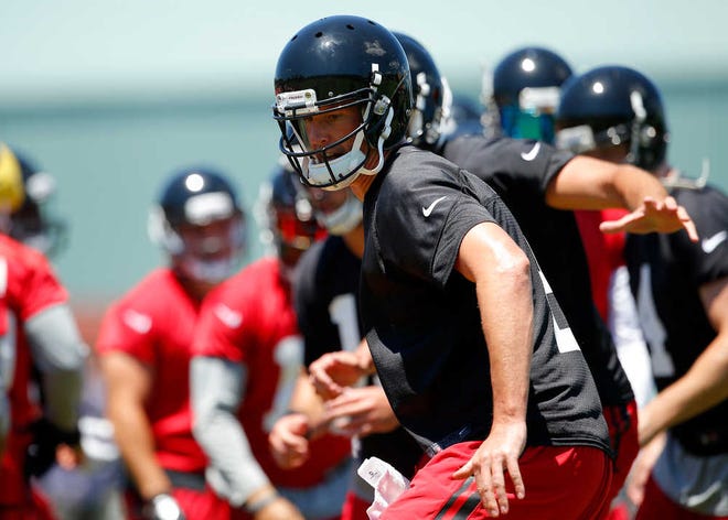Atlanta quarterback Matt Ryan takes part in a drill on Tuesday. He is coming off a 16-interception season, the most since his roookie season.