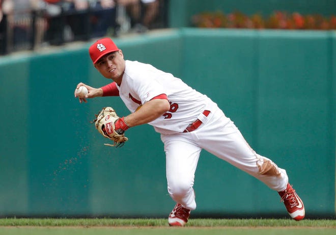 St. Louis Cardinals shortstop Aledmys Diaz throws to second base during the second inning of a game against the Chicago Cubs on Maay 25 in St. Louis.