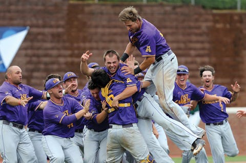 East Carolina players celebrate an 8-4 victory over William & Mary to win the NCAA Charlottesville Regional championship baseball game Sunday in Charlottesville, Va.