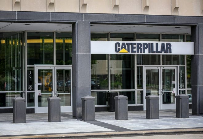 The main entrance to Caterpillar headquarters is seen while under lockdown in Peoria on Friday. Caterpillar employees were under lockdown for about an hour Friday afternoon after "a credible workplace violence threat was made to a downtown Peoria Caterpillar building," according to Caterpillar spokeswoman Lisa Miller.