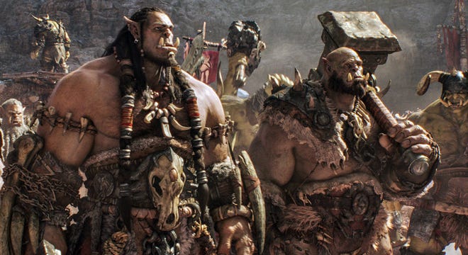 Orc chieftain Durotan, voiced by Toby Kebbell, left, and Orgrim, voiced by Rob Kazinsky, are shown in a scene from "Warcraft," based on the Blizzard Entertainment video game.