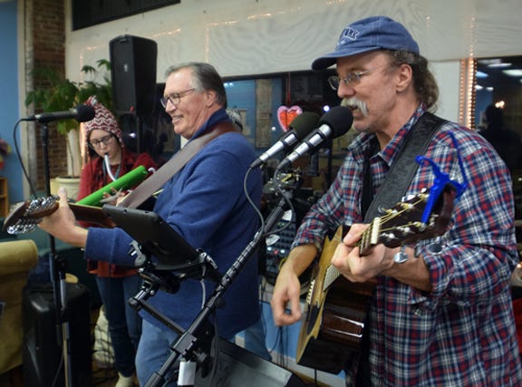 Dan Phillips, right, plays solo and sometimes with various friends during monthly ARTcrawls in downtown New Bern. On Friday night, he will be at The Brown Pelican.