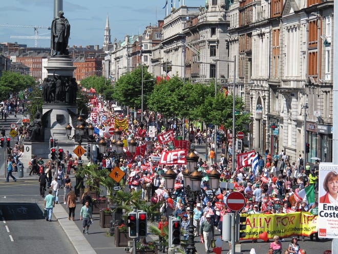 FILE - A Saturday, July 6, 2013 file photo showing thousands of anti-abortion protesters filling Dublin's major thoroughfare, as they march against Ireland's abortion bill. United Nations human rights experts said Thursday June 9, 2016 that Ireland's abortion ban subjects women to discriminatory, cruel and degrading treatment and should be ended for cases involving fatal fetal abnormalities. (AP Photo/Shawn Pogatchnik, File)