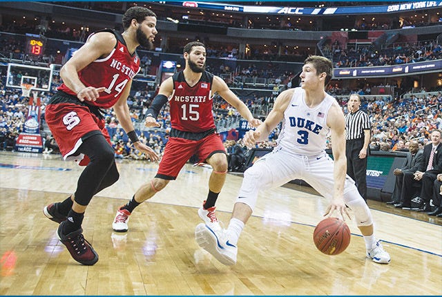 Duke Blue Devils guard Grayson Allen (3) drives to the basket against North Carolina State Wolfpack guard Caleb Martin (14) and Cody Martin (15) during the second round of the 2016 ACC Men's Basketball Conference tournament at the Verizon Center in Washington D.C. on March 9, 2016. PJ Ward-Brown/The Courier-Tribune