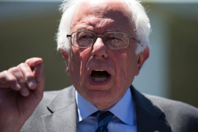 Democratic presidential candidate Sen. Bernie Sanders, I-Vt. speaks to reporters outside the White House in Washington Thursday following a meeting with President Barack Obama.