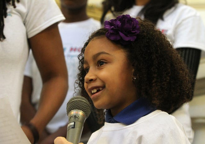 Jeniah Simao, a second grader at Achievement First Providence Mayoral Academy, addresses a rally at the State House in March in support of charter schools. Providence Journal/Bob Breidenbach