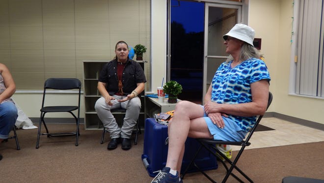 Kael Knowles, left, says he felt "discriminated against" when someone at his job complained about him using the men's room. Kael was born a girl but has transitioned to male in adulthood. He met with Michelle Hayes, right, and others at a transgender support group in DeLand recently. NEWS-JOURNAL/MARK HARPER