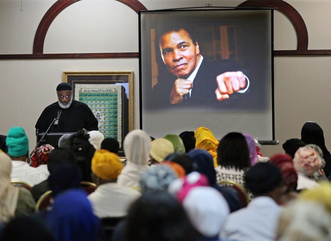 Imam Nadim Ali delivers the closing remarks during an interfaith memorial service for Muhammad Ali at the Atlanta Masjid of Al-Islam on Thursday, June 9, 2016, in Atlanta. (Curtis Compton/Atlanta Journal-Constitution via AP)