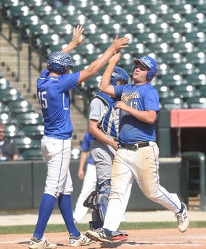 Limestone's Sam Koeppel (15) and Tanner Bradley (13) celebrate a run scored in the fourth inning against St. Viator during the Class 3A state baseball tournament third-place game at Silver Cross Field, Saturday, June 11, 2016, in Joliet, Ill. (Paul Michna/Daily Herald via AP) MANDATORY CREDIT; MAGS OUT, TV OUT