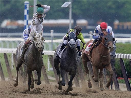 Creator, left, with jockey Irad Ortiz Jr. up, wins the 148th running of the Belmont Stakes horse race, Saturday, June 11, 2016, in Elmont, N.Y.