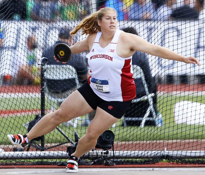 Wisconsin's Kelsey Card competes in the women's discus at the NCAA outdoor track and field championships in Eugene, Ore., Saturday, June 11, 2016. Card won the event. (AP Photo/Ryan Kang)