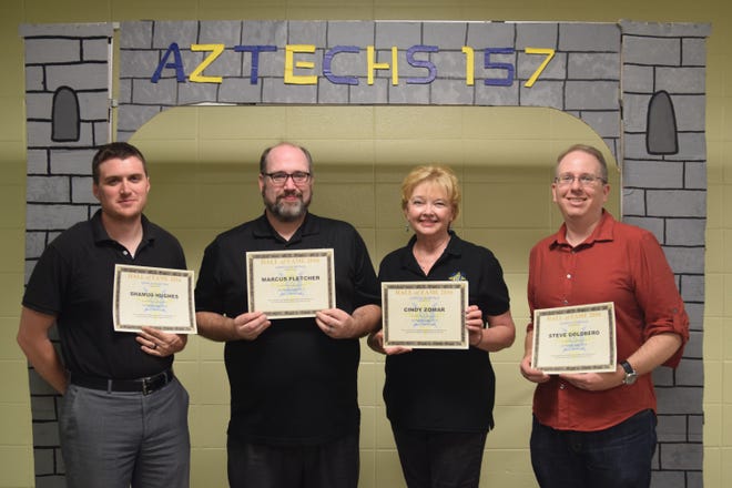 Pictured, from left: Shamus Hughes, Marcus Fletcher, Cindy Zomar and Steven Goldberg are the inaugural members of the AZTECHS 157 robotics team hall of fame. Courtesy Photo