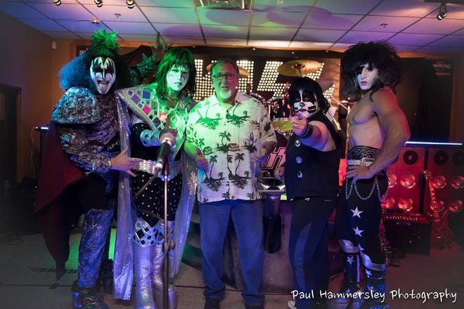 In the photo: Malden's Rob Smith (aka Ace Frehley, 2nd from the left) and his Malden based Kiss tribute act, Kiss Forever, with 5th member, Malden Musings author, Peter "God of Thunder" Levine. Kiss Forever will appear at the Jenkins Auditorium on Sept 24. Tickets now available. Courtesy Photo/Paul Hammersley