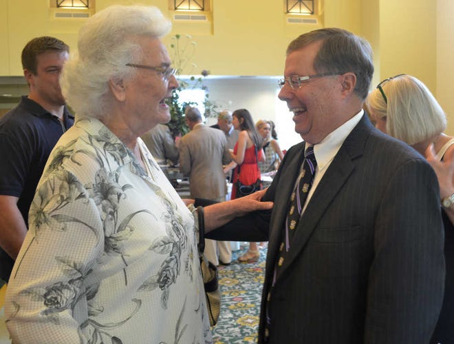 Glenn Doak, senior pastor at First Presbyterian Church of Athens, speaks to Ruby Hodgson, 90, who has been a member of the church since 1948. Doak retired Sunday, June 12, 2016. Hilary Butschek / OnlineAthens