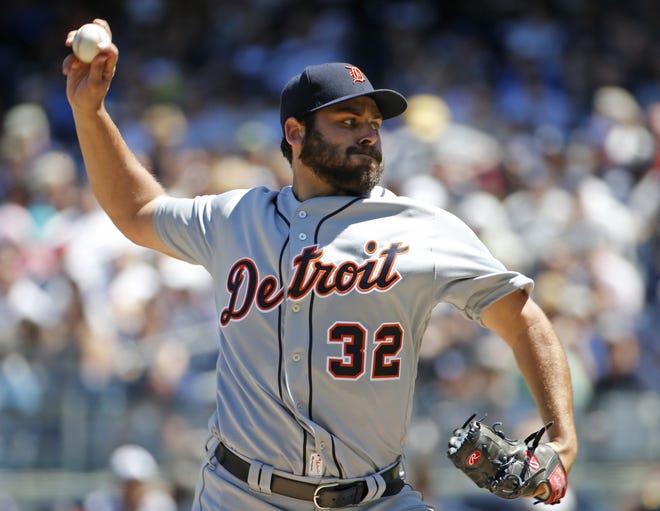 Detroit Tigers starting pitcher Michael Fulmer (32) delivers during the first inning of a baseball game against the New York Yankees, Sunday, June 12, 2016, in New York. (AP Photo/Kathy Willens)