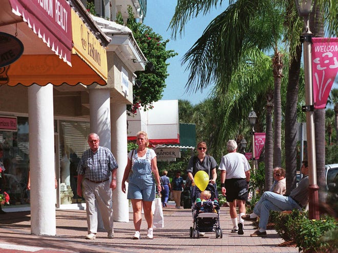 Shoppers stroll along St. Armands Circle in Sarasota. Retail consultant Robert Gibbs said Monday that the area could support an additional 80,000 square feet of retail and restaurants during the next five years.