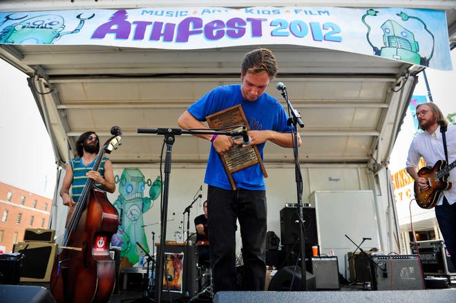 The Darnell Boys open on the Pulaski Street stage at Athfest in Athens, Ga., Friday, June 22, 2012. (AJ Reynolds/Staff)