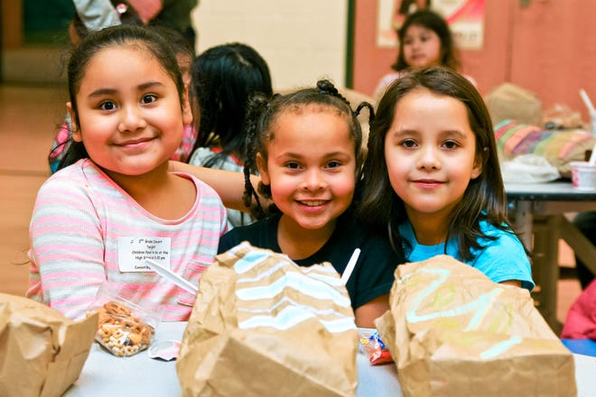 Kids Food Basket has served more than 1 million sack suppers since July 2015. A little more than 12,000 were served to Holland children. CONTRIBUTED