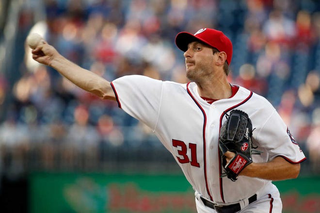Washington Nationals starting pitcher Max Scherzer throws during the first inning of a baseball game against the Chicago Cubs at Nationals Park, Monday, June 13, 2016, in Washington. (AP Photo/Alex Brandon)