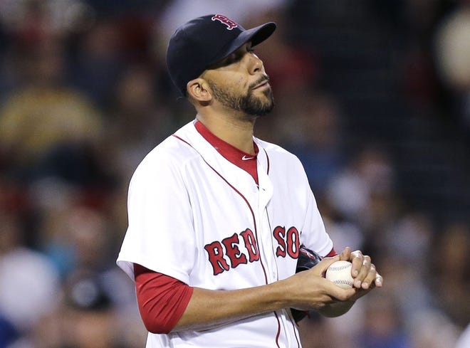 Red Sox pitcher David Price reacts after giving up a home run to Baltimore's Jonathan Schoop during the eighth inning of Boston's 3-2 loss on Tuesday night.