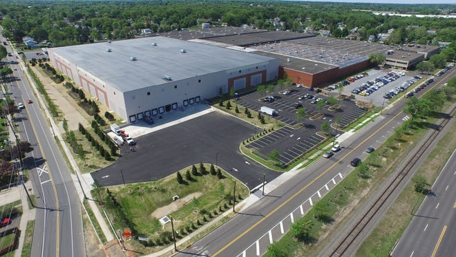 Simon & Schuster has completed a 200,000-square-foot expansion of the Riverside Distribution Center in Delran.