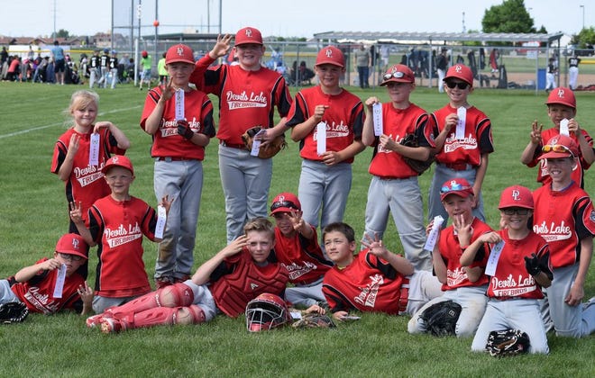 The Devils Lake 10U Cal Ripken Baseball Team placed third in the Gerrells Tournament in Grand Forks on June 10-11. Members of the team are: Front Row: Mason Palmer, Ben Brodina, Zack Boren, Fausten Olson, Cullen Schmaltz, Drew Hofstad, Max Palmer and Brendan Connors. Back Row: Ava Beck, Beau Brodina, Jackson Baeth, Parker Brodina, Trason Beck, Blake Lippert and Logan Stokke. The team is coached by Dustin Brodina, Travis Beck and Jens Stokke.