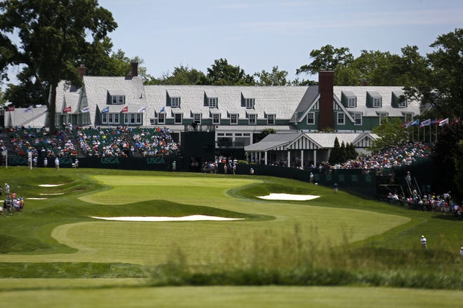 The 18th hole and clubhouse at Oakmont Country Club hold special memories for Wilmington's Donnie Bowers and Billy Anderson, who will have roles in this week's U.S. Open at the legendary course outside Pittsburgh. Gene J. Puskar/Associated Press