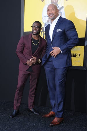 Kevin Hart (left) and Dwayne Johnson attend the Los Angeles premiere of "Central Intelligence" at the Regency Village Theater last week.