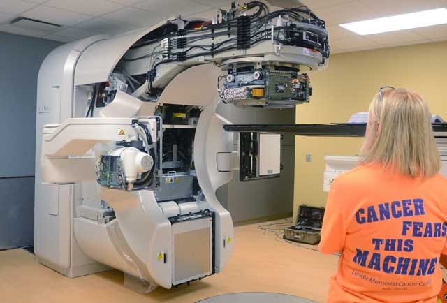 Debra Parrish, cancer center manager, looks at the new linear accelerator radiation treatment machine at Lenoir Memorial Hospital’s Cancer Center on Wednesday.