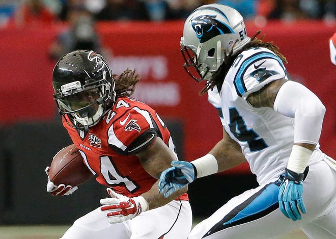 FILE/Associated Press Atlanta running back Devonta Freeman rushed for more than 1,000 yards in his breakout season last year. He finished seventh in the league in rushing and tied for the number of combined touchdowns in the NFL with 14.