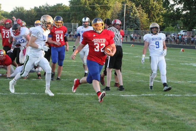 Ida's Eric Bugg scores a touchdown for the South during the Monroe County All-Star Football Game. (Photo by TAMMY MASSINGILL)