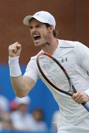 Tim Ireland/Associated Press Britain's Andy Murray celebrates after winning a point against Canada's Milos Raconic at Queen's Club. Murray set a record with his fifth Queen's Club title. Tennis Championships London, England, Sunday June 19, 2016. (AP Photo/Tim Ireland)