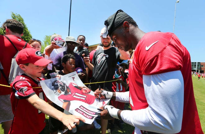 John Bazemore/Associated Press Atlanta Falcons wide receiver Julio Jones signs autographs after practice last week. With veteran Roddy White gone, Jones is stepping up and taking a leadership role among his fellow wide receivers.