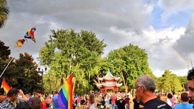 A rainbow appears over Lake Eola in Orlando. (Credit: Twitter: Josh Murdock @ProfessorJosh)