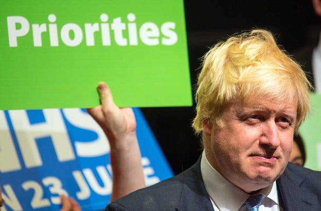 Former London Mayor Boris Johnson prepares to speak at a Vote Leave campaign event on Sunday. British voters head to the polls on Thursday to decide if the country should stay in the European Union or leave it.
