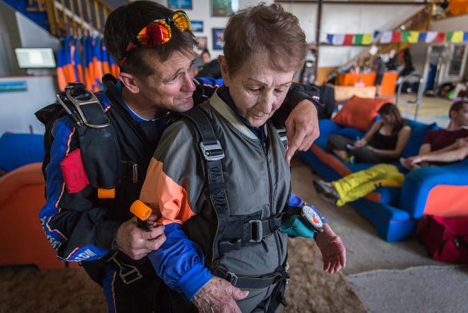 Jumptown skydiving instructor Dan Aukstikalnis, left, gives Janice Lefebre, 87, some last-minute instructions before boarding a plane to go skydiving together, Sunday, June 19, 2016, in Orange, Mass. Lefebre's children bought her a skydiving package for her birthday after learning that jumping out of a plane was something she always wanted to do.