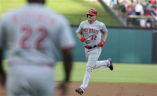 Cincinnati Reds' Jay Bruce (32) runs the bases after hitting a three-run home run during the first inning of a baseball game against the Texas Rangers in Arlington, Texas, Tuesday, June 21, 2016. (AP Photo/LM Otero)